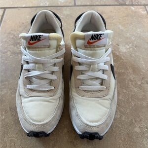 Nike Off-White & Black Low-Top Trainers with Orange Swoosh